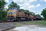 Two GEs lead a tank car train west on the Houston Sub 